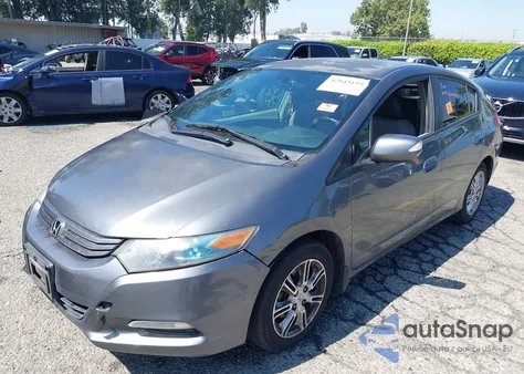 2011 Honda Insight Ex from USA, damaged, VIN JHMZE2H72BS012579